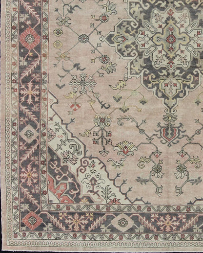 Antique Hand - Knotted Turkish Medallion Oushak in Blush, Ivory and Charcoal. Keivan Woven Arts: rug EN - 176497, Country of Origin: Turkey; Type: Oushak; Design: Diamond Medallion, Oushak Medallion Measures: 9'9 x 11'10 This striking vintage Turkish... - Keivan Woven ArtsEN - 176497 - 11020Rug