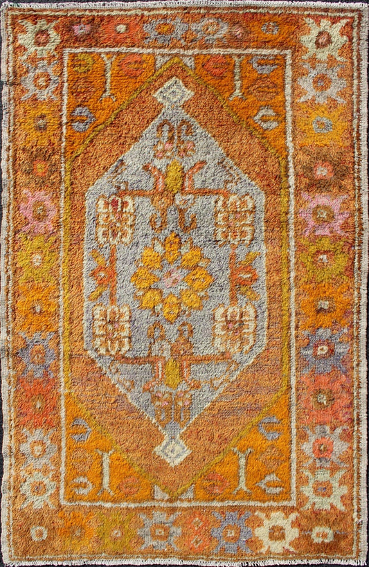 Vintage Turkish Oushak in Orange, Copper& Yellow Tones With Geometric Medallion. Vintage Turkish Oushak rug with geometric medallion, rug EN - 176568, country of origin / type: Turkey / Oushak, circa 1930 This Oushak runner features a uniq... - Keivan Woven ArtsEN - 176568 - 10688