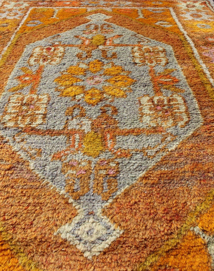 Vintage Turkish Oushak in Orange, Copper& Yellow Tones With Geometric Medallion. Vintage Turkish Oushak rug with geometric medallion, rug EN - 176568, country of origin / type: Turkey / Oushak, circa 1930 This Oushak runner features a uniq... - Keivan Woven ArtsEN - 176568 - 10688Rug
