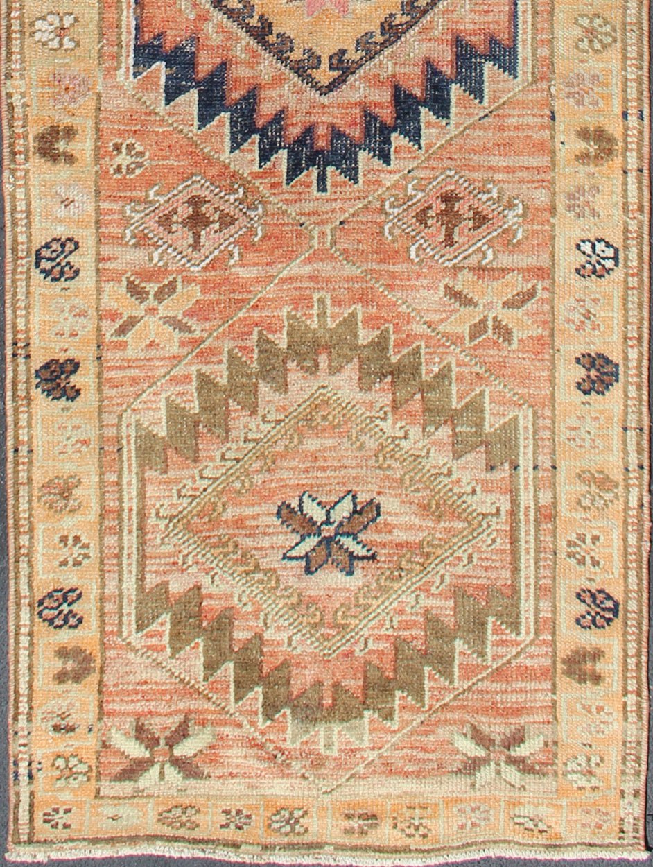 Coral colored Vintage Oushak Runner with Geometric Medallions kwarugs Vintage Turkish runner with multi - medallion design, rug en - 176587, country of origin / type: Turkey / Oushak, circa 1960 This Oushak runner from Turkey features a creat... - Keivan Woven ArtsEN - 176587 - 11443Rug