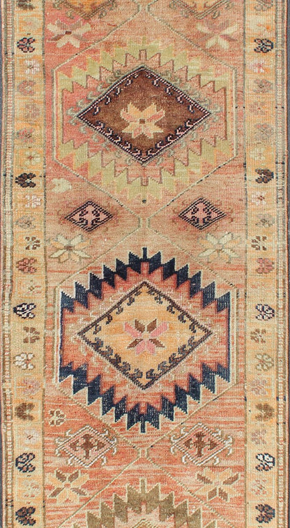 Coral colored Vintage Oushak Runner with Geometric Medallions kwarugs Vintage Turkish runner with multi - medallion design, rug en - 176587, country of origin / type: Turkey / Oushak, circa 1960 This Oushak runner from Turkey features a creat... - Keivan Woven ArtsEN - 176587 - 11443Rug