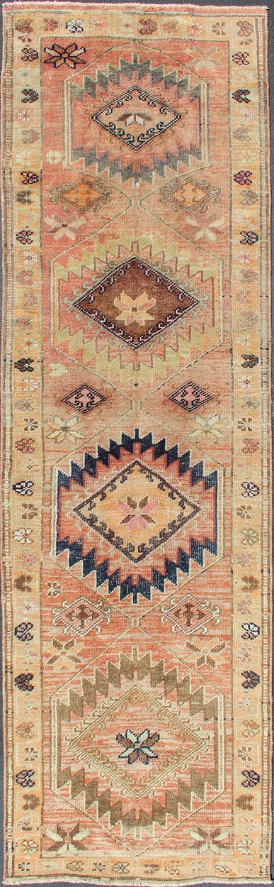 Coral colored Vintage Oushak Runner with Geometric Medallions kwarugs Vintage Turkish runner with multi - medallion design, rug en - 176587, country of origin / type: Turkey / Oushak, circa 1960 This Oushak runner from Turkey features a creat... - Keivan Woven ArtsEN - 176587 - 11443Rug