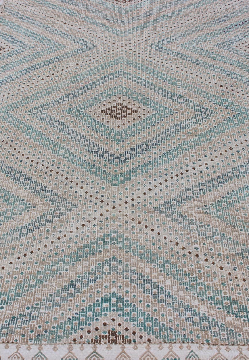 Diamond Design Vintage Turkish Embroidered Kilim in Tan, blue, Cream, and Light Green. Keivan Woven Arts / rug/EN - 176753, country of origin / type: Turkey / Kilim, circa 1950 Measures: 6'1 x 9'2 This Embroidered kilim rug from Turkey fea... - Keivan Woven ArtsEN - 176753 - 11239Rug