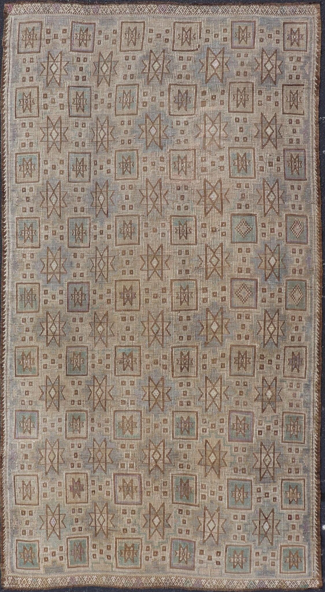 Vintage Turkish Embroidered Kilim in Light Green, Tan, and Hints of Lavender Measures: 5'0 x 9'8 This vintage flat weave Kilim was hand woven in Turkey during the 1950's. The light taupe field is decorated with tribal - like motifs, with ... - Keivan Woven ArtsEN - 176775 - 18878Rug