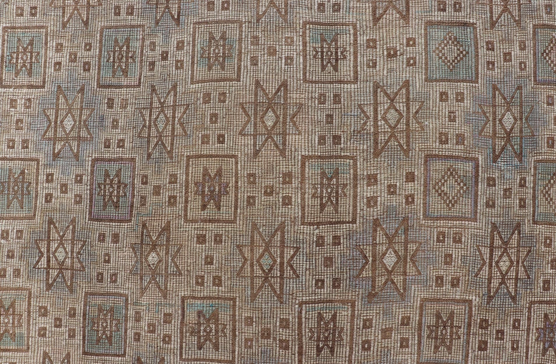 Vintage Turkish Embroidered Kilim in Light Green, Tan, and Hints of Lavender Measures: 5'0 x 9'8 This vintage flat weave Kilim was hand woven in Turkey during the 1950's. The light taupe field is decorated with tribal - like motifs, with ... - Keivan Woven ArtsEN - 176775 - 18878Rug