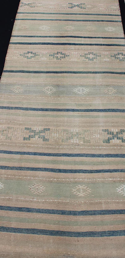 Vintage Turkish Kilim Runner With Stripes in Green, Gray and Cream Shades Measures: 2'8 x 10'1. This flat - woven Kilim runner from Turkey features an exciting composition consisting of stripes rendered in natural tones of brown, blue, and gray, a... - Keivan Woven ArtsEN - 176849 - 1 - 11229Rug