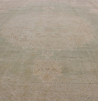 Distressed Turkish Carpet with Floral Medallion in Light Green, Tan and Taupe kwarugs Unique Turkish distressed rug with muted colors in taupe, light green, beige rug en - 176863, country of origin / type: Turkey / 1940, This vintage Turki... - Keivan Woven ArtsEN - 176863 - 12531Rug