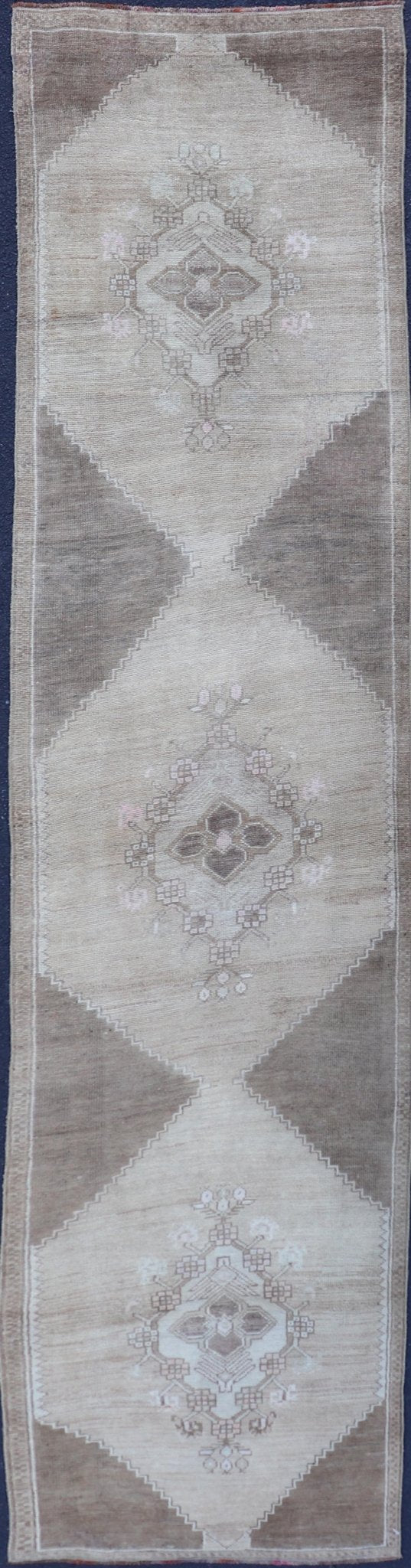 Measures: 2'10 x 13'3 Vintage Turkish Oushak Runner Neutral and Warm Colors with Tribal Medallions. rug/EN - 176926 Keivan Woven Arts / Vintage Oushak runner. Turkey mid20th century. This vintage Oushak carpet from mid - 20th century Turkey feature... - Keivan Woven ArtsEN - 176926 - 21712Rug