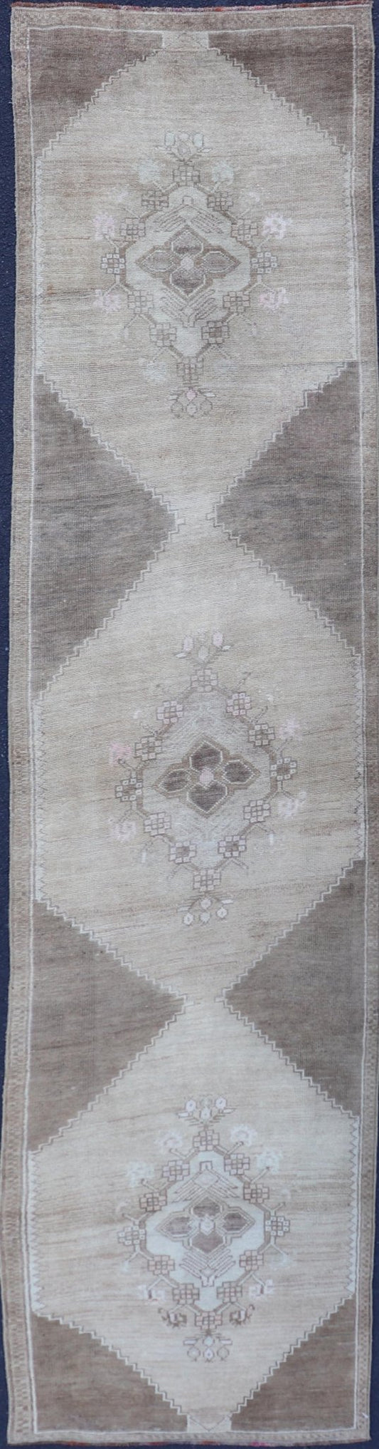 Measures: 2'10 x 13'3 Vintage Turkish Oushak Runner Neutral and Warm Colors with Tribal Medallions. rug/EN - 176926 Keivan Woven Arts / Vintage Oushak runner. Turkey mid20th century. This vintage Oushak carpet from mid - 20th century Turkey feature... - Keivan Woven ArtsEN - 176926 - 21712Rug