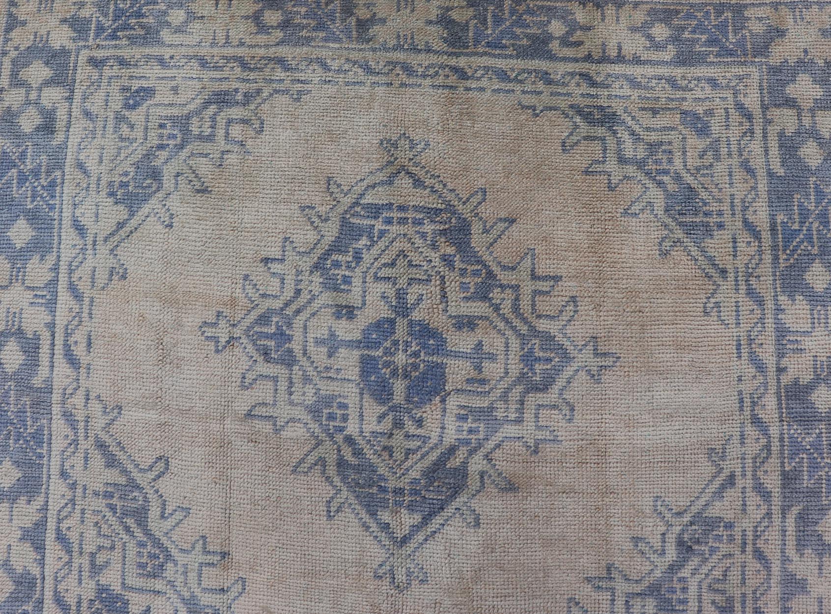 Measures: 5'0 x 12'5 Turkish Oushak Gallery Rug in Muted Blue and Cream with Geometric Design. Country of Origin: Turkey; Type: Oushak; Design: Medallion; Keivan Woven Arts: rug EN - 176948; This beautiful vintage Oushak was hand - knotted in Tu... - Keivan Woven ArtsEN - 176948 - 21913Rug