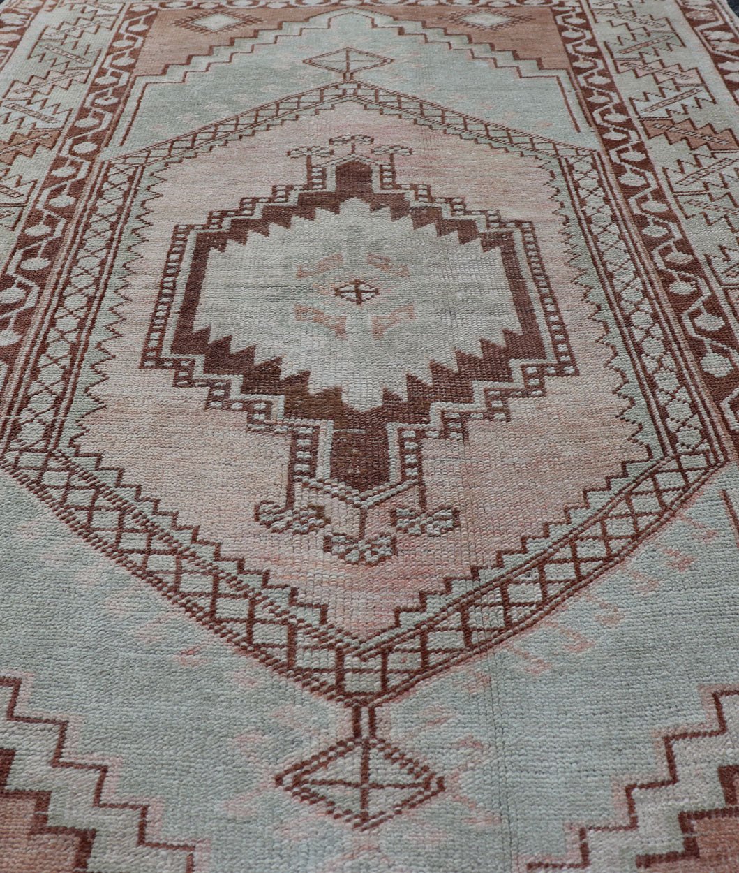 Turkish Oushak vintage rug with Traditional Design in Muted Blue, Brown, salmon. Vintage Muted color antique Turkish Oushak carpet with traditional floral medallion design, rug EN - 178029, country of origin / type: Turkey / Oushak, circa 1940 ... - Keivan Woven ArtsEN - 178029 - 14414Rug