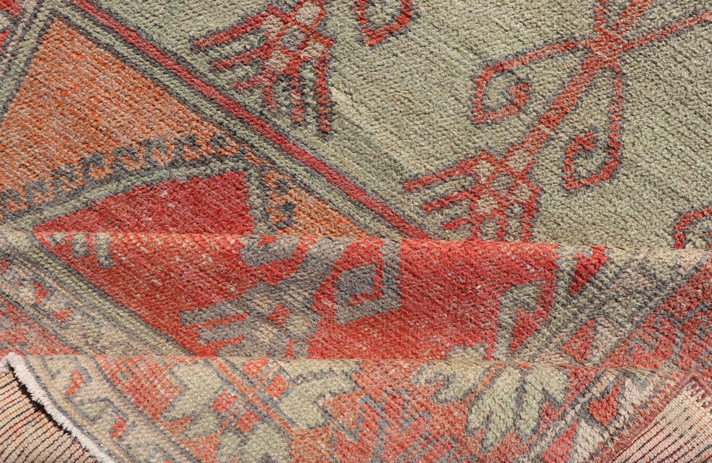 Gallery Rug, Vintage Turkish in Faded Red, Coral, Orange, Soft Pink and Green. Turkish gallery rug with faded colors, rug EN - 178032, country of origin / type: Turkey / Oushak, circa 1940 This fun and vibrant Oushak runner from 1930s feat... - Keivan Woven ArtsEN - 178032 - 14242Rug