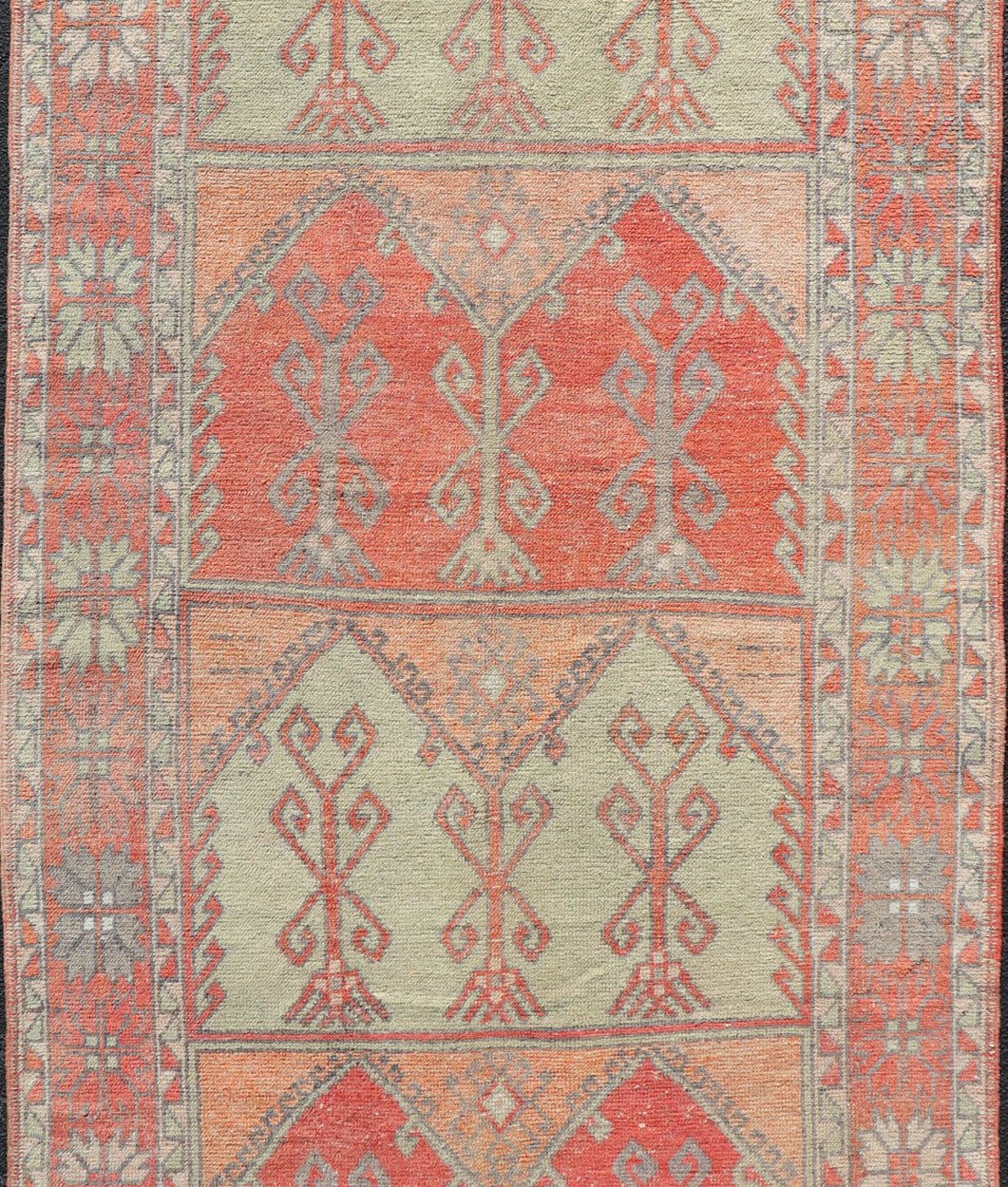 Gallery Rug, Vintage Turkish in Faded Red, Coral, Orange, Soft Pink and Green. Turkish gallery rug with faded colors, rug EN - 178032, country of origin / type: Turkey / Oushak, circa 1940 This fun and vibrant Oushak runner from 1930s feat... - Keivan Woven ArtsEN - 178032 - 14242Rug
