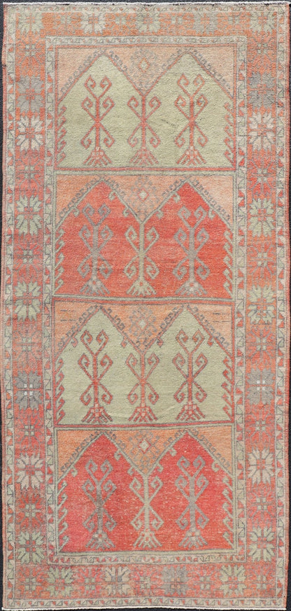 Gallery Rug, Vintage Turkish in Faded Red, Coral, Orange, Soft Pink and Green. Turkish gallery rug with faded colors, rug EN - 178032, country of origin / type: Turkey / Oushak, circa 1940 This fun and vibrant Oushak runner from 1930s feat... - Keivan Woven ArtsEN - 178032 - 14242Rug