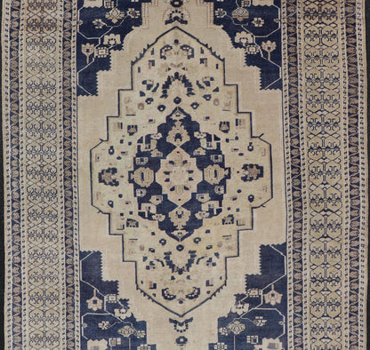 Vintage Hand - Knotted Turkish Oushak in Wool with Sub - Geometric Medallion Design This vintage Turkish Oushak rug has been hand - knotted in wool and features a large central medallion design rendered in blue, cream, tan and ivory tones. A compleme... - Keivan Woven ArtsEN - 178064 - 19508