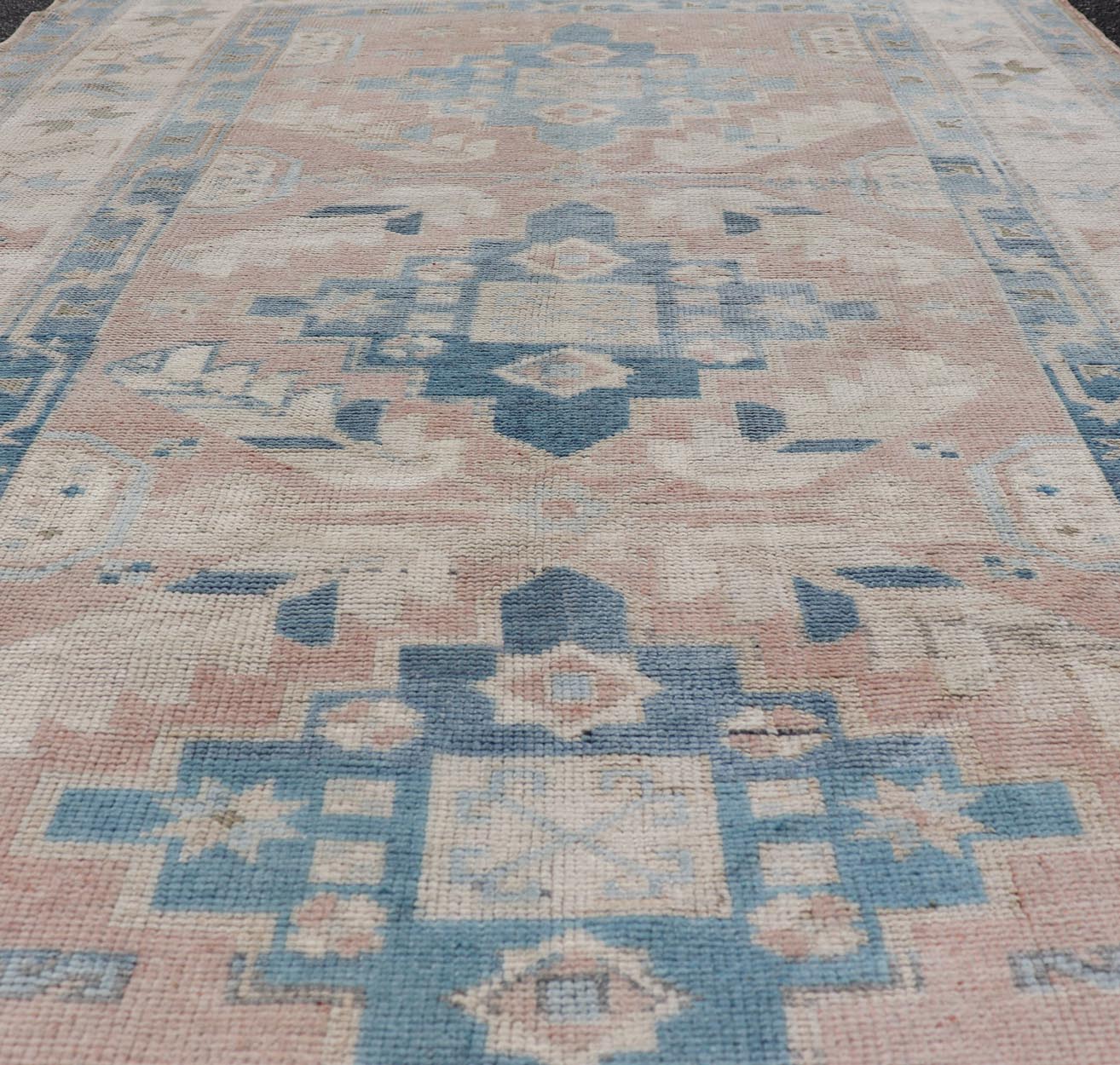 Turkish Oushak Vintage Carpet with Tri Medallion Design. Turkish Oushak Vintage Carpet from Turkey a variety of blue, salmon, beige and natural tones. Keivan Woven Arts / rug EN - 178331, country of origin / type: Turkey / Oushak, circa 1940 Measu... - Keivan Woven ArtsEN - 178331 - 23625Rug