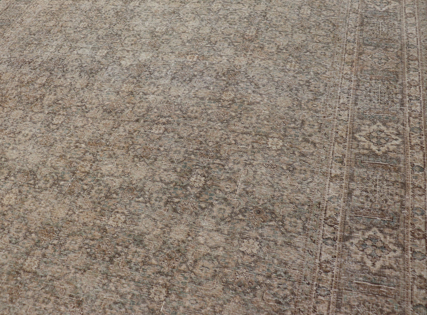 Light Green, Brown & Tan Persian Tabriz Antique Rug in All Over Herati Design . Distressed antique Tabriz in light green background, Brown, taupe and tan colors, Antique Persian Tabriz rug, rug EN - 178439, country of origin / type: Iran / Tabriz... - Keivan Woven ArtsEN - 178439 - 14250Rug