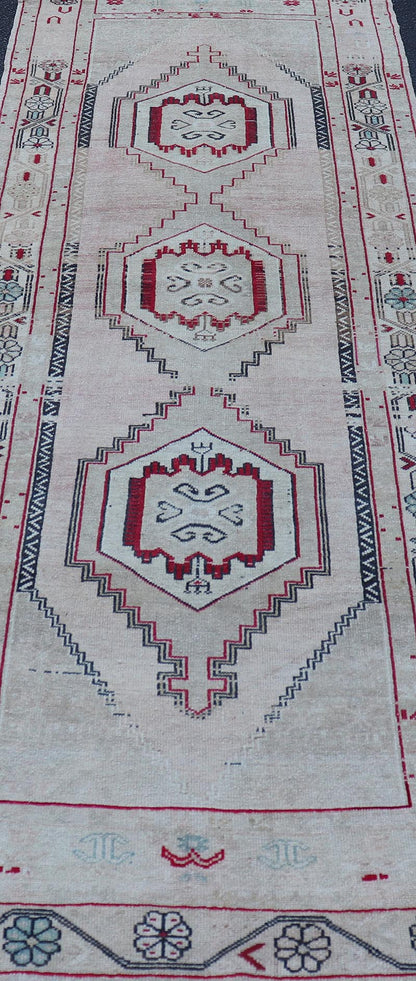 Vintage Turkish Oushak Runner with Medallions in Cream, dark blue, pink and Red. Keivan Woven Arts / rug EN - 178468, country of origin / type: Turkey / Oushak, circa 1940. Measures: 3'7 x 10'6 This Turkish Oushak runner features stylized ... - Keivan Woven ArtsEN - 178468 - 23631Rug