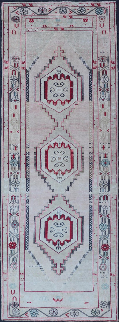 Vintage Turkish Oushak Runner with Medallions in Cream, dark blue, pink and Red. Keivan Woven Arts / rug EN - 178468, country of origin / type: Turkey / Oushak, circa 1940. Measures: 3'7 x 10'6 This Turkish Oushak runner features stylized ... - Keivan Woven ArtsEN - 178468 - 23631Rug