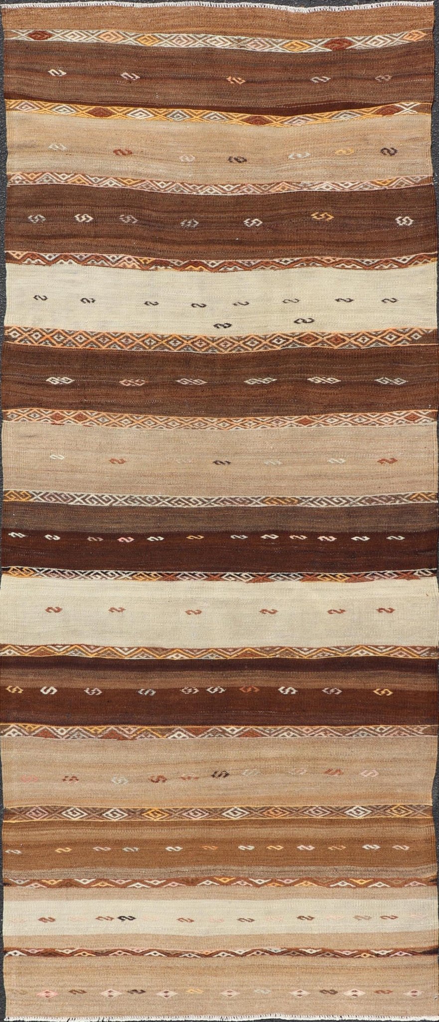 Vintage Earthy Kilim Gallery Runner with Stripe Design in Multi Colors & Motif's. Keivan Woven Arts / rug EN - 178669, country of origin / type: Turkey / Kilim, circa 1950. Measures: 4'6 x 11'7 Featuring a striking stripe design, this unique mid - c... - Keivan Woven ArtsEN - 178669 - 23504Rug