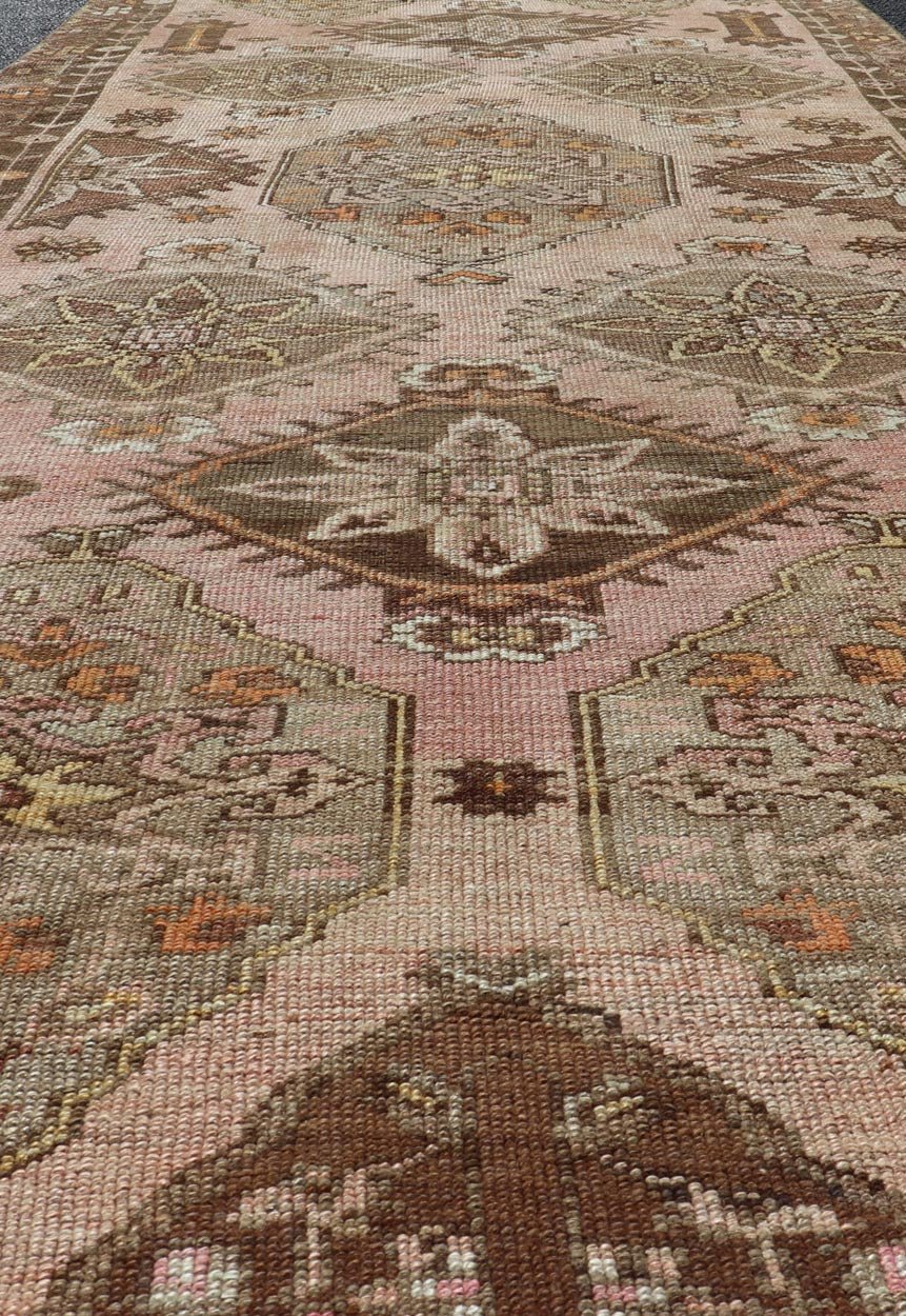 Vintage Hand - Knotted Turkish Kars Galley Rug in Wool with Medallion Design. Keivan Woven Arts; rug EN - 178729, country of origin / type: Turkey / Oushak, circa 1930. Measures: 4'7 x 13'3 This vintage Turkish Kars gallery runner has been h... - Keivan Woven ArtsEN - 178729 - 23510Rug