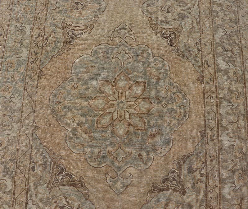 Measures: 4'3 x 11'7 Vintage Turkish Gallery Rug in Earth Tones & Light Grey with Floral Medallions. Keivan Woven Arts / Rug / EN - 178758, Keivan Woven Arts / country of origin / type: Turkey / Oushak, circa 1940. This beautiful vintage Ousha... - Keivan Woven ArtsEN - 178758 - 21925Rug