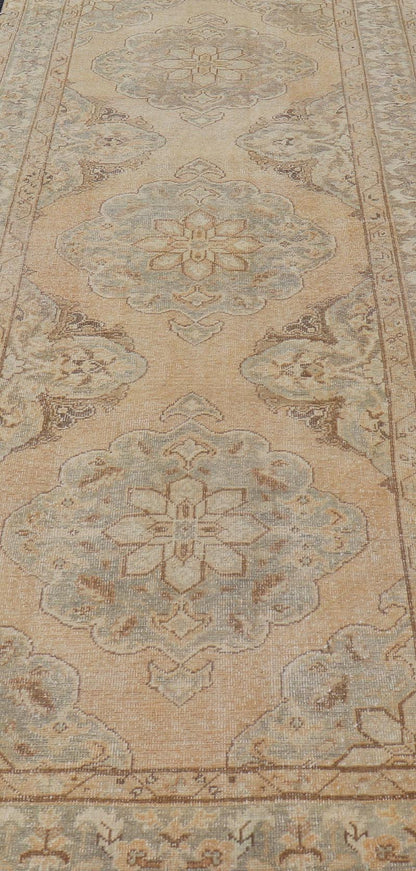 Measures: 4'3 x 11'7 Vintage Turkish Gallery Rug in Earth Tones & Light Grey with Floral Medallions. Keivan Woven Arts / Rug / EN - 178758, Keivan Woven Arts / country of origin / type: Turkey / Oushak, circa 1940. This beautiful vintage Ousha... - Keivan Woven ArtsEN - 178758 - 21925Rug