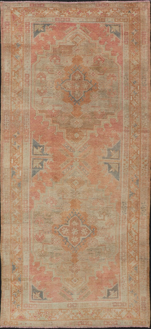 Vintage Turkish Oushak Gallery Rug with Tribal Medallion Design Variegated Red. Keivan Woven Arts / rug EN - 178760, country of origin / type: Turkey / Oushak, circa 1940 This vintage Turkish Oushak gallery runner features two large medallions expandi... - Keivan Woven ArtsEN - 178760 - 17508Rug
