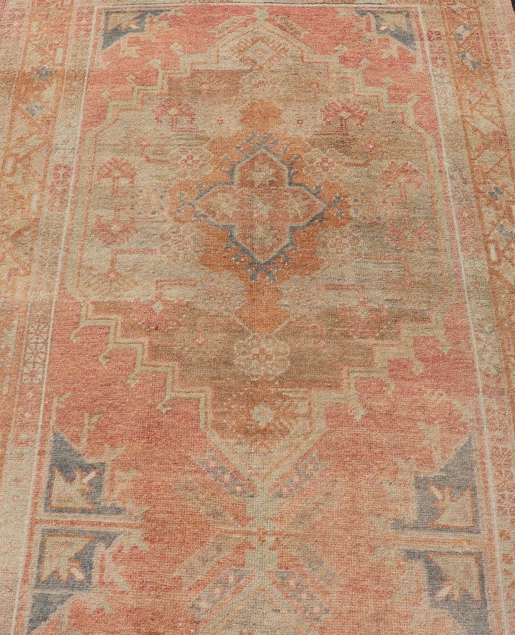 Vintage Turkish Oushak Gallery Rug with Tribal Medallion Design Variegated Red. Keivan Woven Arts / rug EN - 178760, country of origin / type: Turkey / Oushak, circa 1940 This vintage Turkish Oushak gallery runner features two large medallions expandi... - Keivan Woven ArtsEN - 178760 - 17508Rug