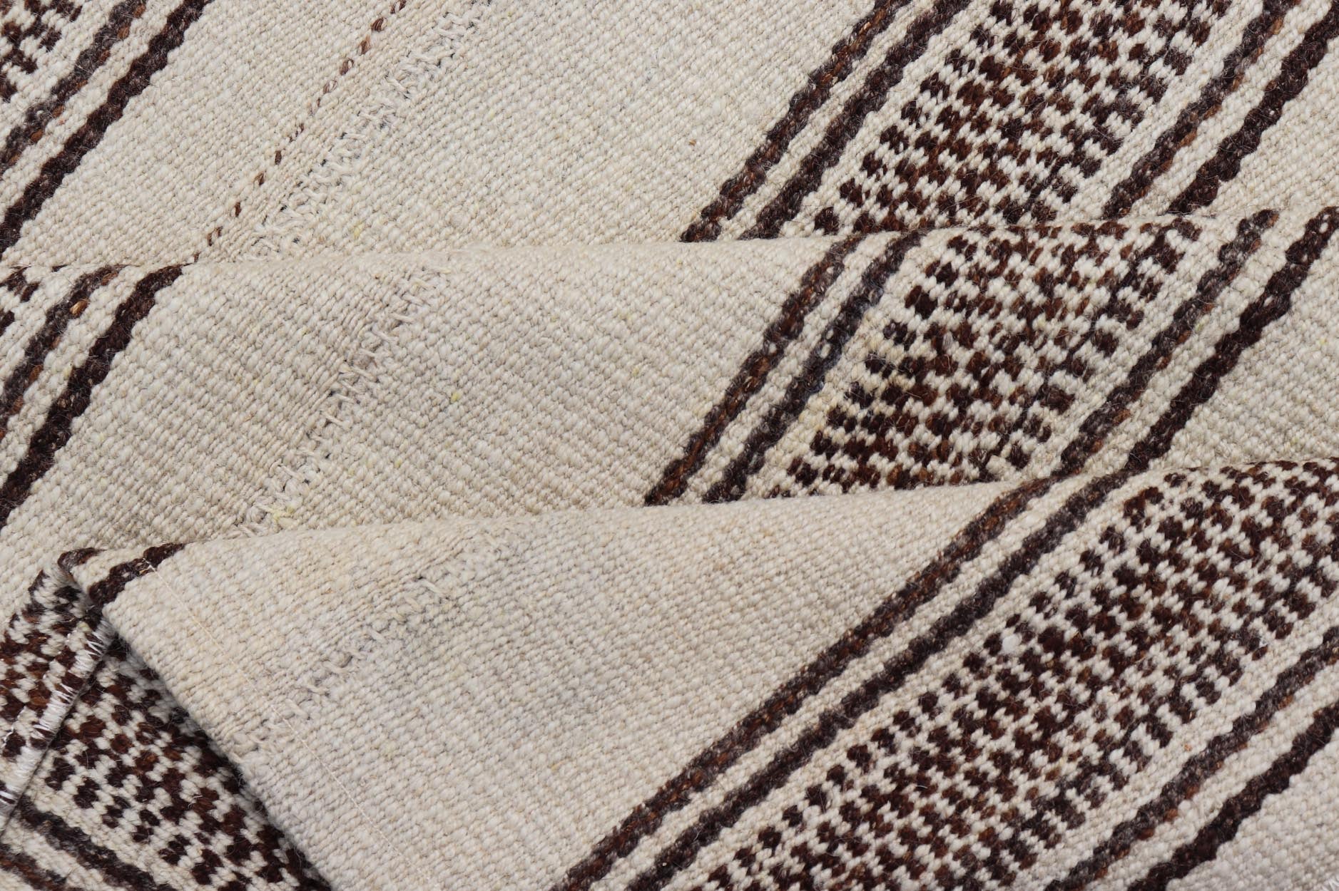 Stripe Design Turkish Vintage Flat - Weave Rug in Brown and Ivory. Keivan Woven Arts / rug EN - 178786, country of origin / type: Turkey / Kilim, circa 1950 Measures: 4'5 x 5'1 Woven during the early - 20th century in Turkey, this Kilim is decorated w... - Keivan Woven ArtsEN - 178786 - 24187Rug