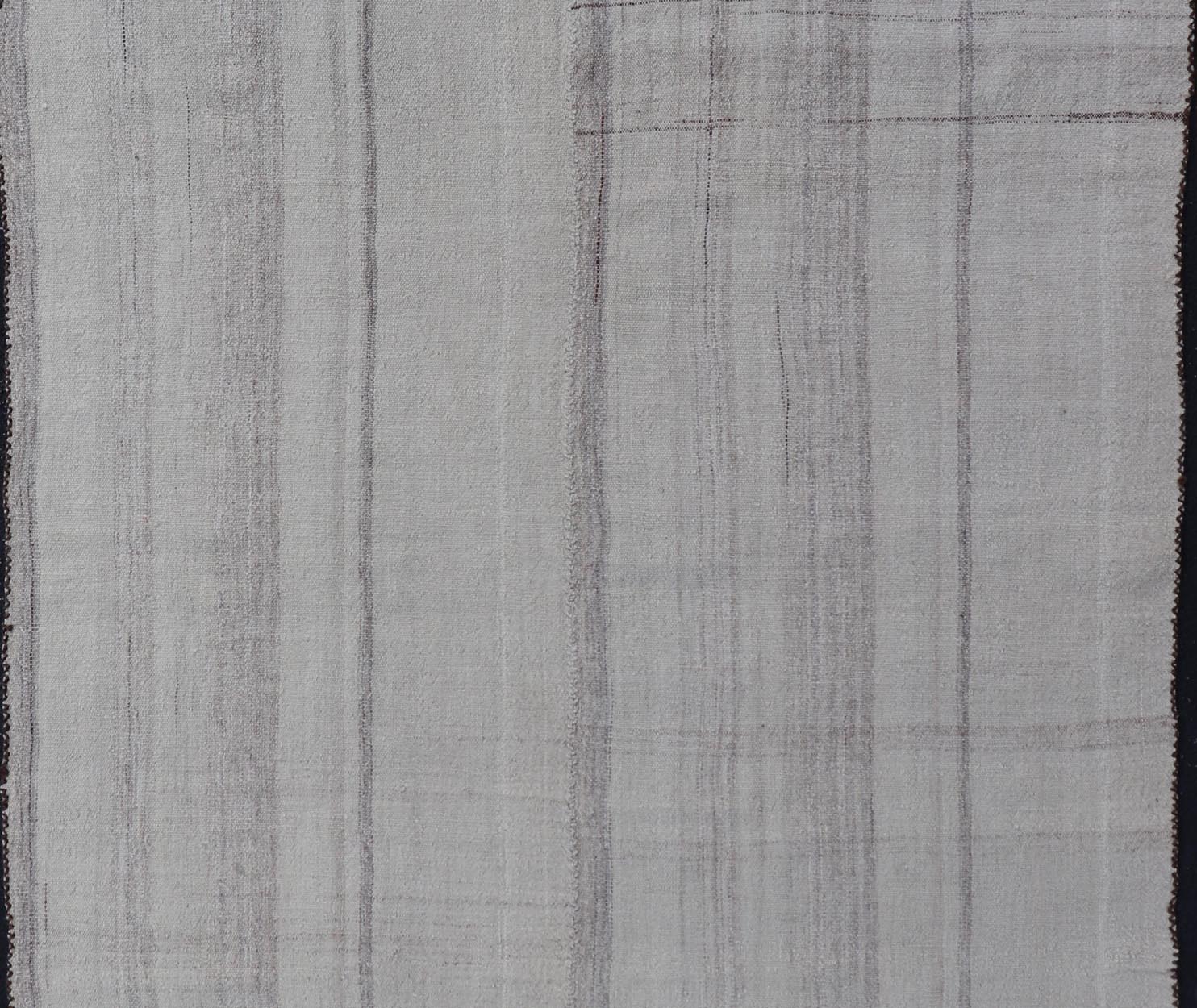 Measures: 4'10 x 7'0 Stripe Design Turkish Vintage Kilim Rug in Shades of Ivory, Cream, and Taupe. Keivan Woven Arts / rug EN - 178819, country of origin / type: Turkey / Kilim, circa 1950 This vintage Turkish Kilim rug features a contemporary str... - Keivan Woven ArtsEN - 178819 - 21931Rug