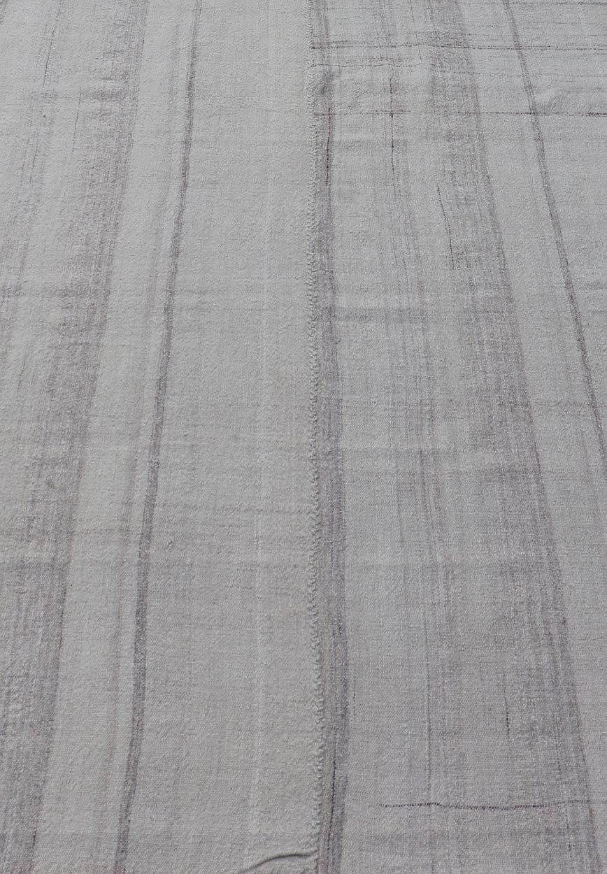 Measures: 4'10 x 7'0 Stripe Design Turkish Vintage Kilim Rug in Shades of Ivory, Cream, and Taupe. Keivan Woven Arts / rug EN - 178819, country of origin / type: Turkey / Kilim, circa 1950 This vintage Turkish Kilim rug features a contemporary str... - Keivan Woven ArtsEN - 178819 - 21931Rug
