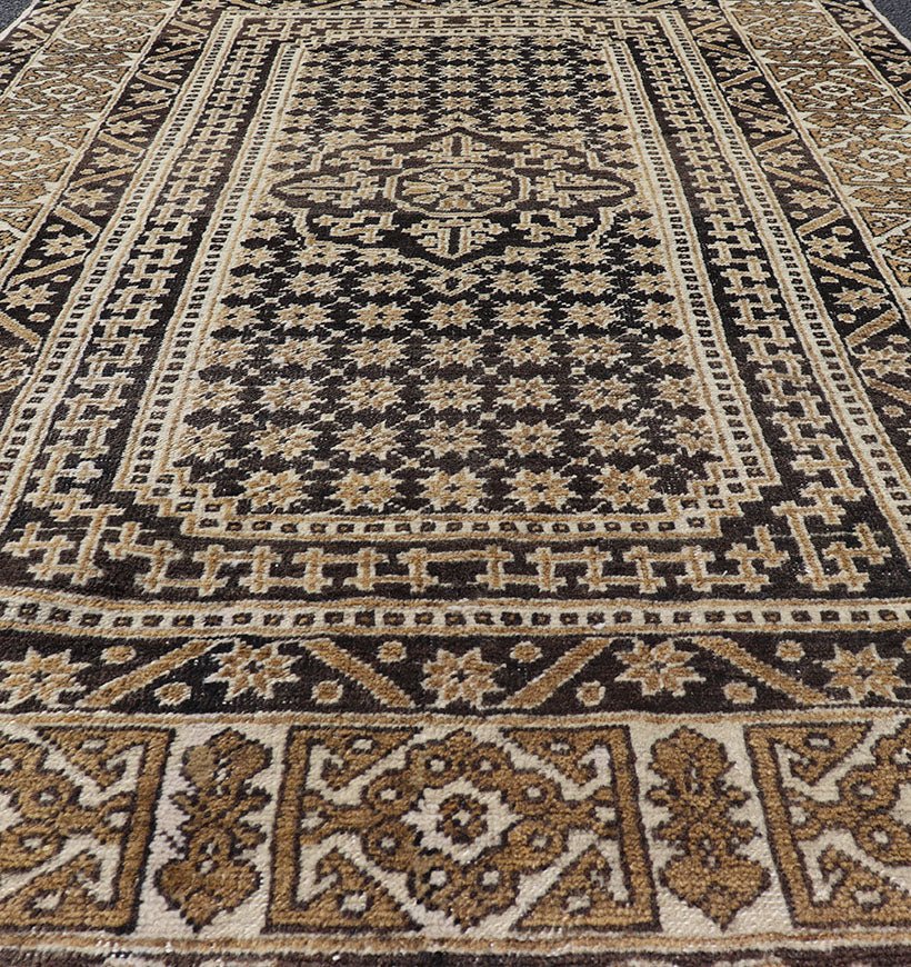Turkish Konya Carpet in Shades of Brown, rug EN - 178916, country of origin / type: Turkey / Oushak, circa mid - 20th Century. Measures:4'2 x 6'3 All - Over with Medallion Design Turkish Carpet in Shades of Brown and Cream - Keivan Woven ArtsEN - 178916 - 17526