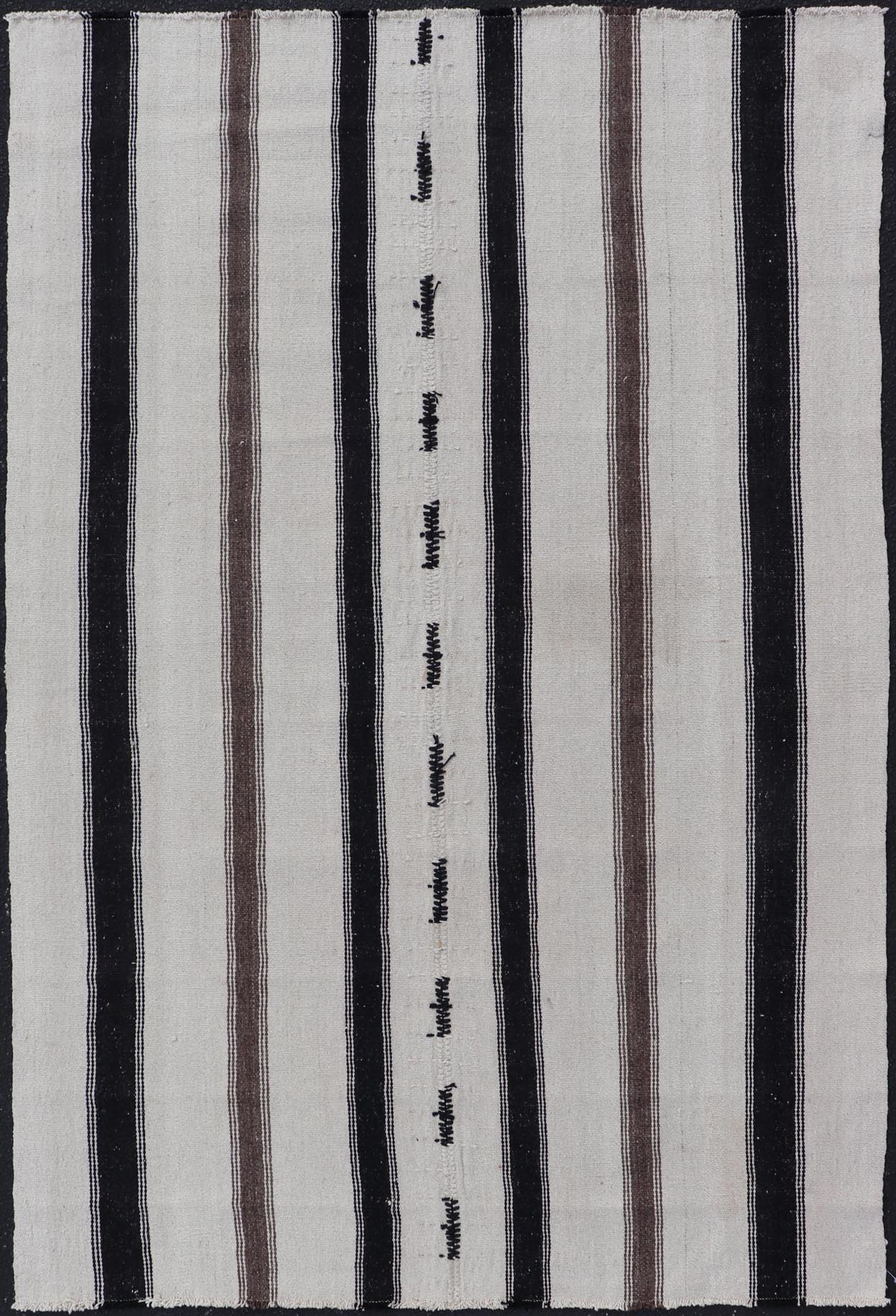 Vintage Turkish Kilim with Stripes in Ivory and Shades of Brown Measures 4'4 x 6'10 This vintage Turkish Kilim features simple design and neutral colors, giving these types of rugs a rise in popularity in modern interiors of the 2020's. ... - Keivan Woven ArtsEN - 178921 - 18902Rug