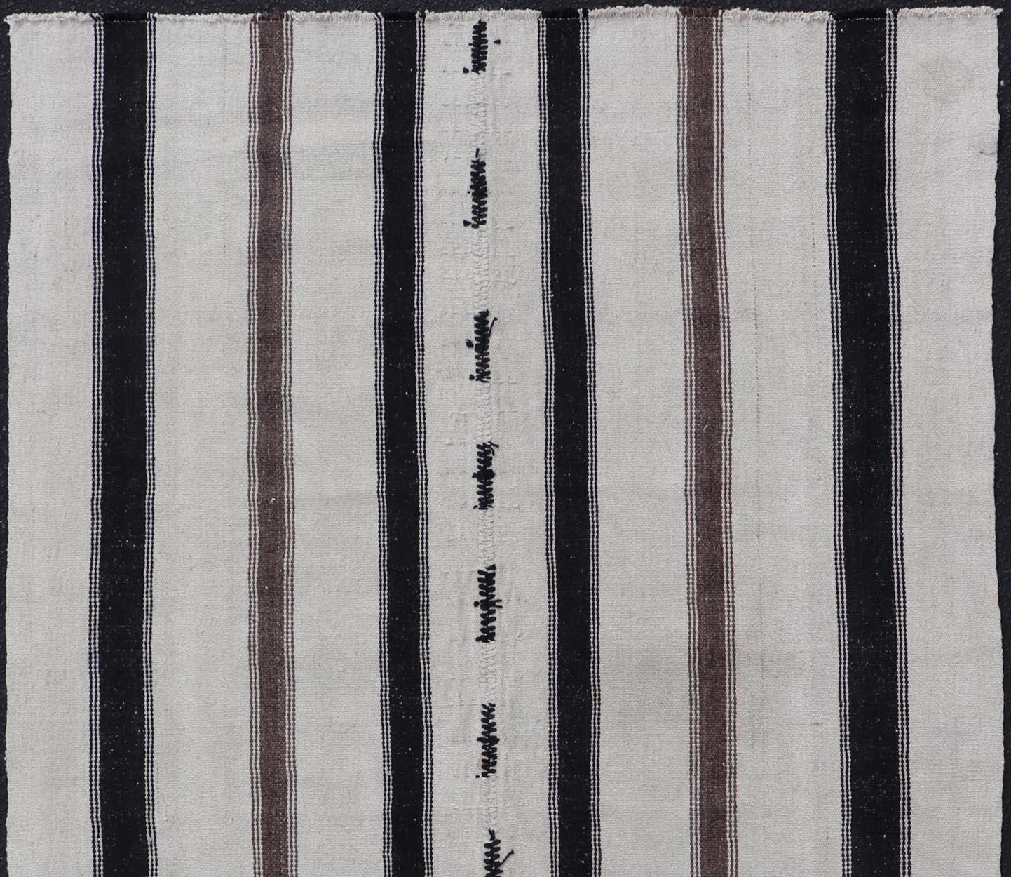 Vintage Turkish Kilim with Stripes in Ivory and Shades of Brown Measures 4'4 x 6'10 This vintage Turkish Kilim features simple design and neutral colors, giving these types of rugs a rise in popularity in modern interiors of the 2020's. ... - Keivan Woven ArtsEN - 178921 - 18902Rug
