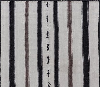 Vintage Turkish Kilim with Stripes in Ivory and Shades of Brown Measures 4'4 x 6'10 This vintage Turkish Kilim features simple design and neutral colors, giving these types of rugs a rise in popularity in modern interiors of the 2020's. ... - Keivan Woven ArtsEN - 178921 - 18902Rug