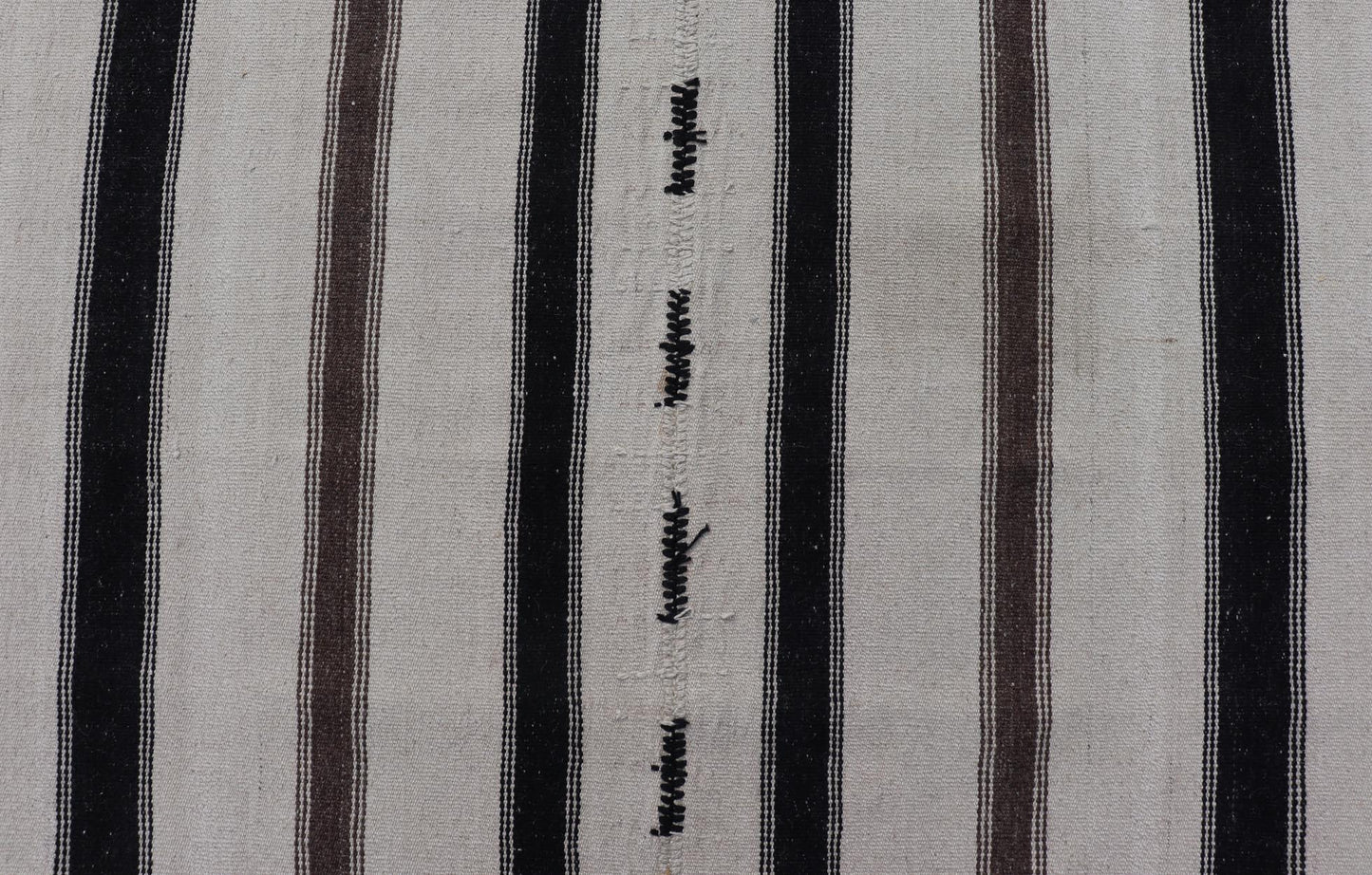 Vintage Turkish Kilim with Stripes in Ivory and Shades of Brown Measures 4'4 x 6'10 This vintage Turkish Kilim features simple design and neutral colors, giving these types of rugs a rise in popularity in modern interiors of the 2020's. ... - Keivan Woven ArtsEN - 178921 - 18902Rug