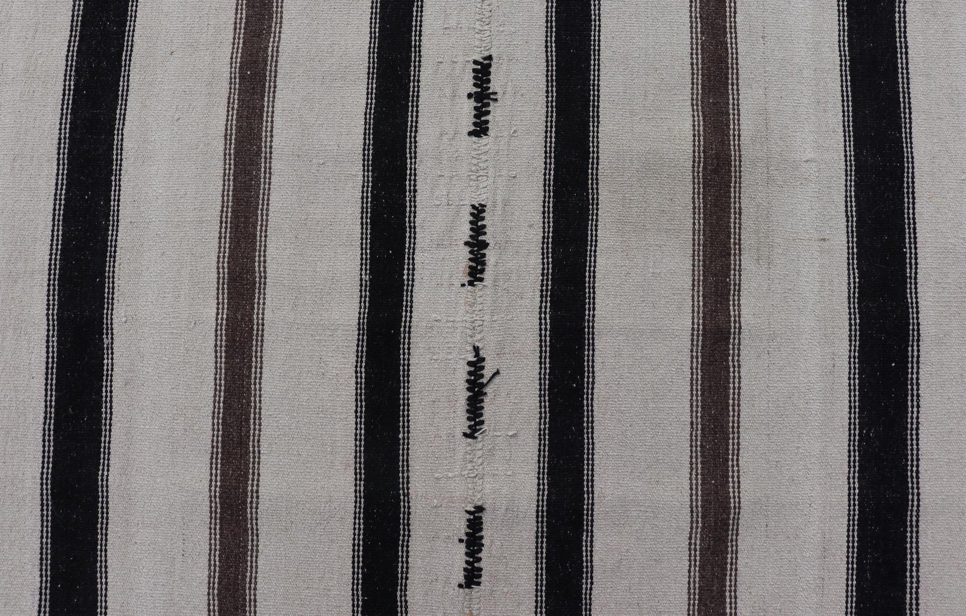 Vintage Turkish Kilim with Stripes in Ivory and Shades of Brown Measures 4'4 x 6'10 This vintage Turkish Kilim features simple design and neutral colors, giving these types of rugs a rise in popularity in modern interiors of the 2020's. ... - Keivan Woven ArtsEN - 178921 - 18902Rug