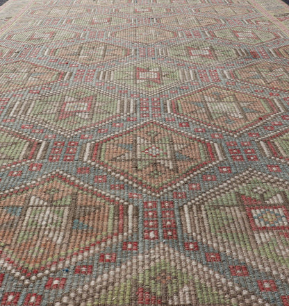 Colorful Vintage Turkish Flat - Weave Tribal Motif Kilim with Embroideries Colorful Vintage Turkish Flat - Weave Tribal Motif Kilim with Embroideries. Keivan Woven Arts / rug /EN - 178922 Mid - 20th Century This Embroidered kilim rug from Turkey... - Keivan Woven ArtsEN - 178922 - 17538Rug