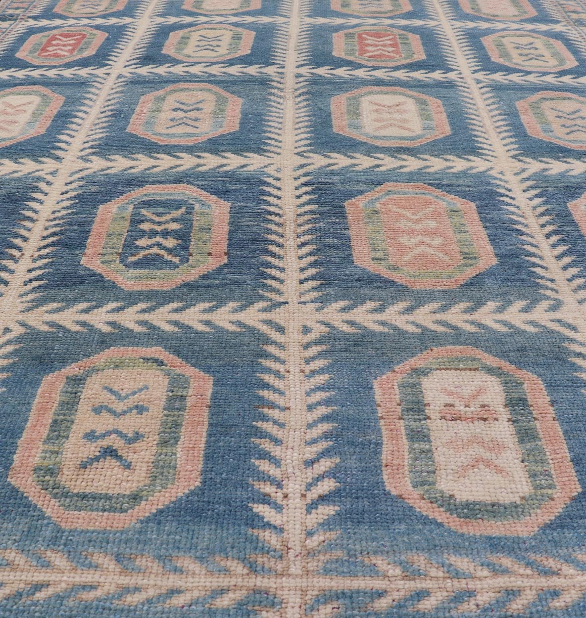 Vintage Hand - Knotted Turkish Tulu Rug in Wool with All - Over Medallion Design This vintage Turkish Tulu rug has been hand - knotted in wool and features an all - over sub - geometric medallion design rendered in multicolor. A complementary, multi - tier... - Keivan Woven ArtsEN - 178934 - 19850Rug