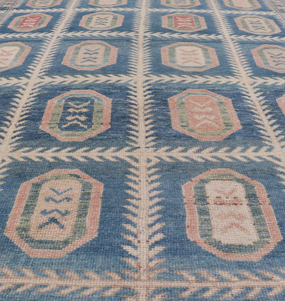 Vintage Hand - Knotted Turkish Tulu Rug in Wool with All - Over Medallion Design This vintage Turkish Tulu rug has been hand - knotted in wool and features an all - over sub - geometric medallion design rendered in multicolor. A complementary, multi - tier... - Keivan Woven ArtsEN - 178934 - 19850Rug