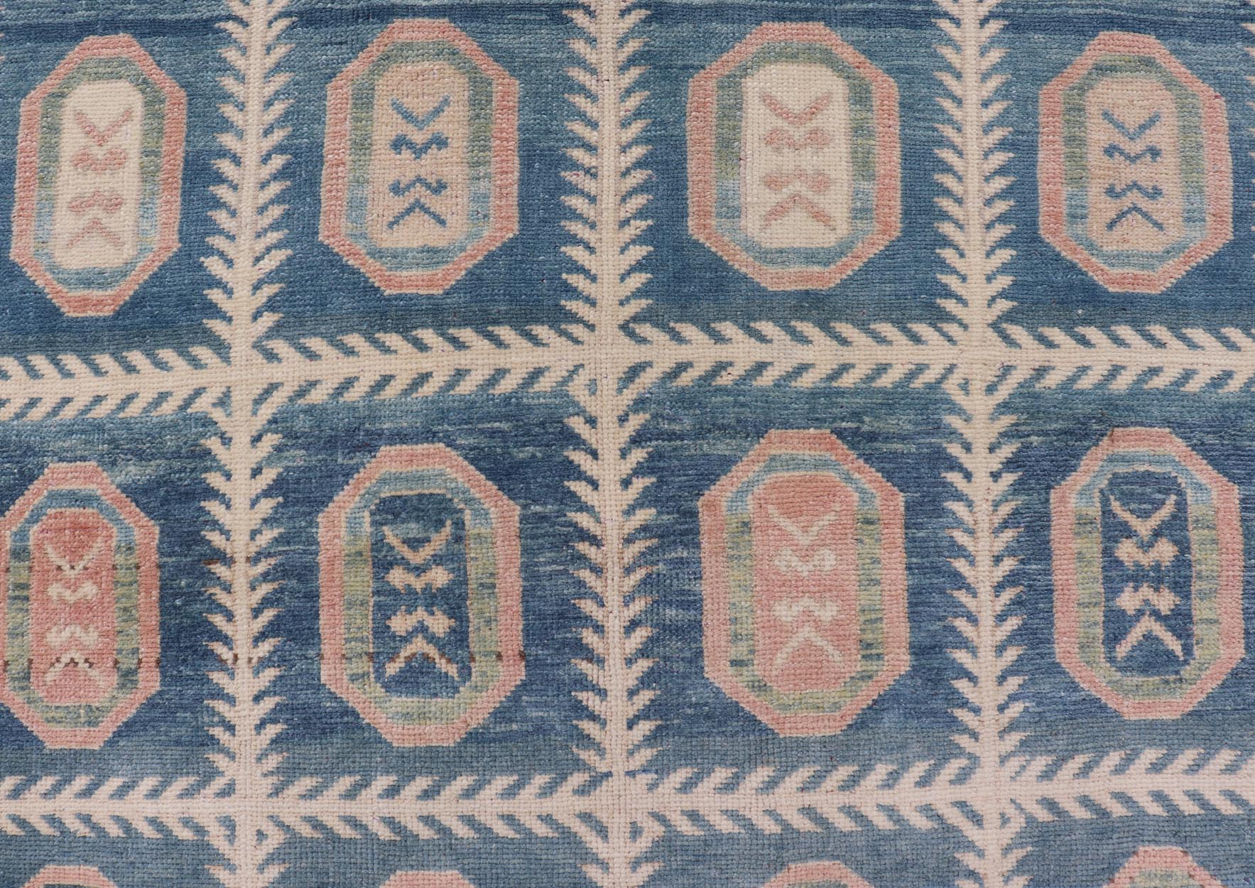 Vintage Hand - Knotted Turkish Tulu Rug in Wool with All - Over Medallion Design This vintage Turkish Tulu rug has been hand - knotted in wool and features an all - over sub - geometric medallion design rendered in multicolor. A complementary, multi - tier... - Keivan Woven ArtsEN - 178934 - 19850Rug