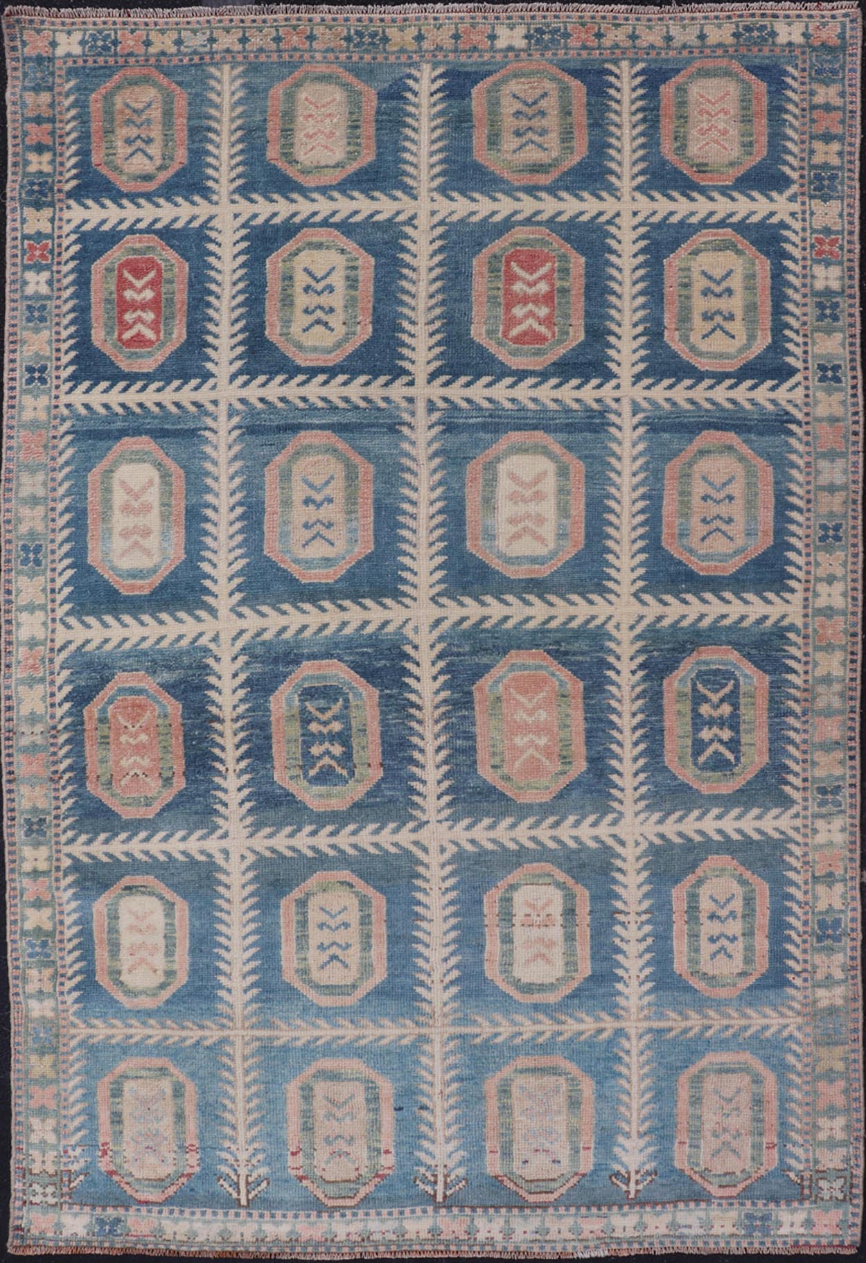 Vintage Hand - Knotted Turkish Tulu Rug in Wool with All - Over Medallion Design This vintage Turkish Tulu rug has been hand - knotted in wool and features an all - over sub - geometric medallion design rendered in multicolor. A complementary, multi - tier... - Keivan Woven ArtsEN - 178934 - 19850Rug