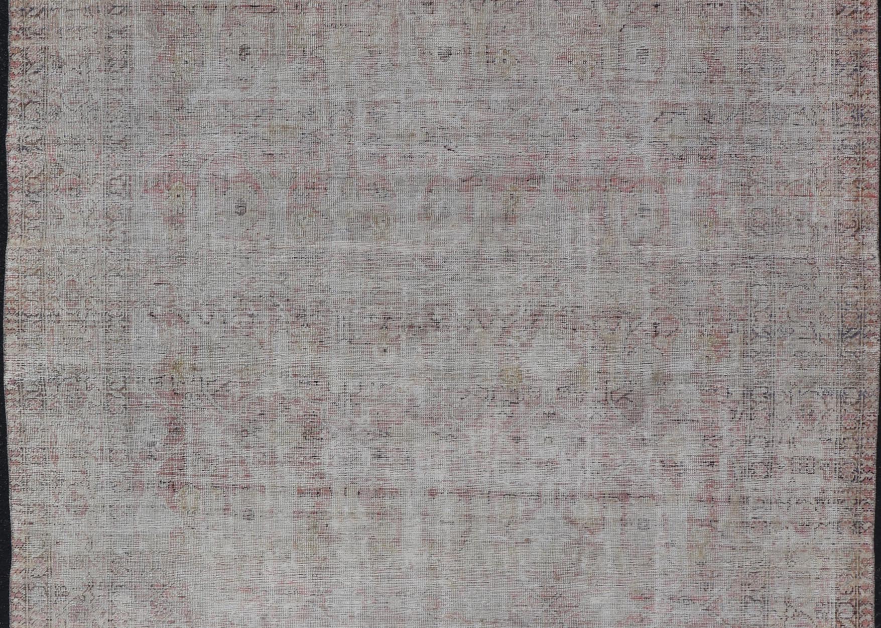 Distressed Antique Hand - Knotted Persian Mahal Rug in Wool in Neutral Tones This antique Persian Mahal rug has been hand - knotted in wool and features an all - over sub - geometric design rendered in neutral tones. A complementary, multi - tiered borde... - Keivan Woven ArtsEN - 178980 - 19856