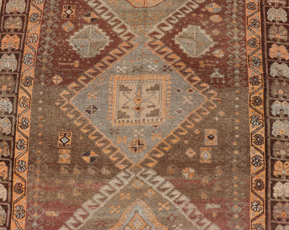 Vintage Hand Knotted Turkish Kars Gallery Rug in Wool with Diamond Design This antique Turkish Kars rug has been hand - knotted in wool and features an all - over, sub - geometric diamond design rendered in orange and earthy tones. A complementary, m... - Keivan Woven ArtsEN - 178983 - 19844