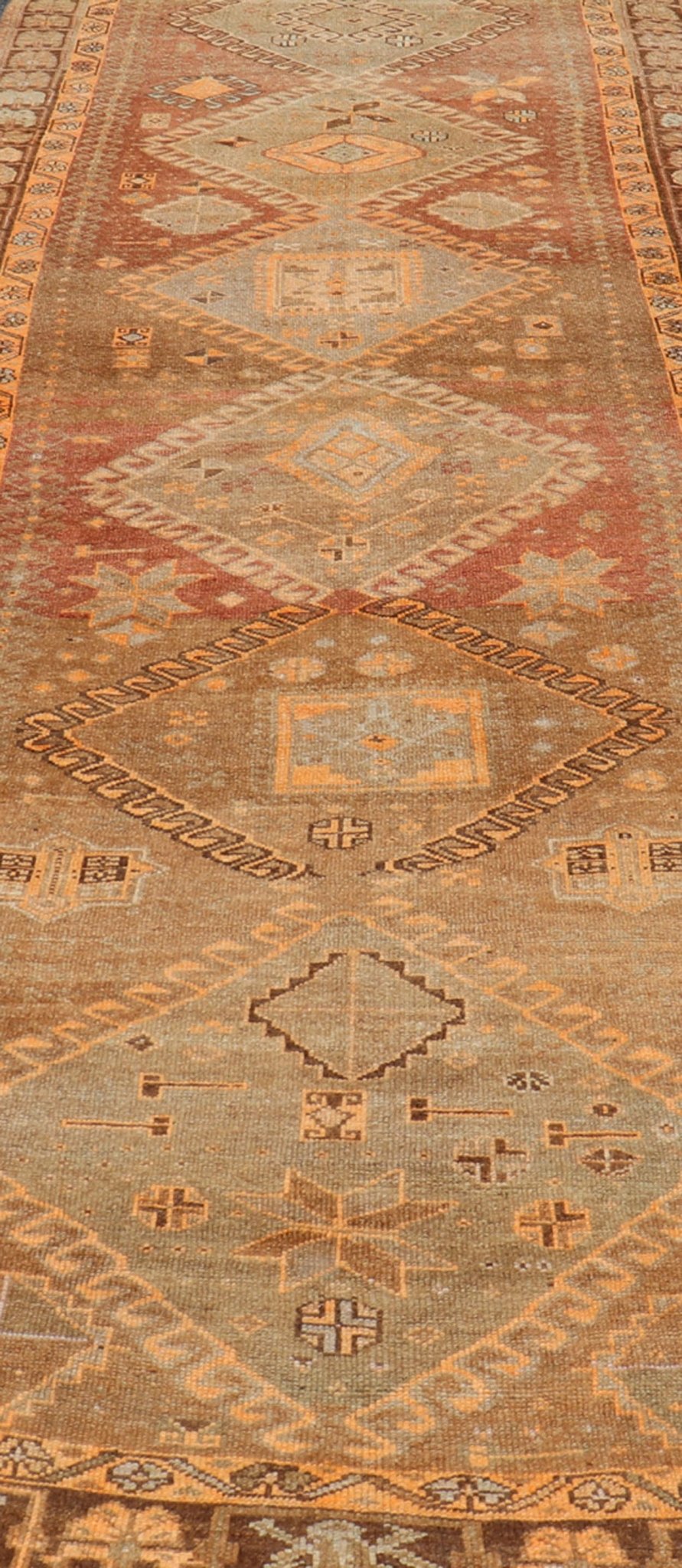 Vintage Hand Knotted Turkish Kars Gallery Rug in Wool with Diamond Design This antique Turkish Kars rug has been hand - knotted in wool and features an all - over, sub - geometric diamond design rendered in orange and earthy tones. A complementary, m... - Keivan Woven ArtsEN - 178983 - 19844