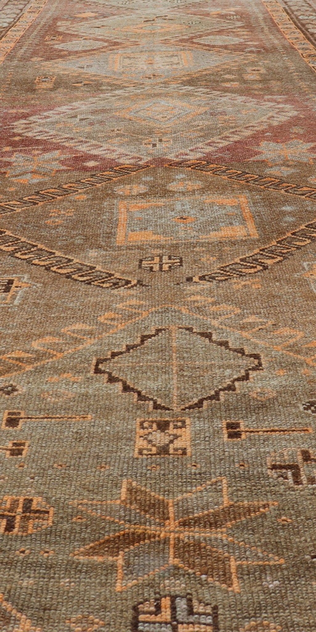 Vintage Hand Knotted Turkish Kars Gallery Rug in Wool with Diamond Design This antique Turkish Kars rug has been hand - knotted in wool and features an all - over, sub - geometric diamond design rendered in orange and earthy tones. A complementary, m... - Keivan Woven ArtsEN - 178983 - 19844