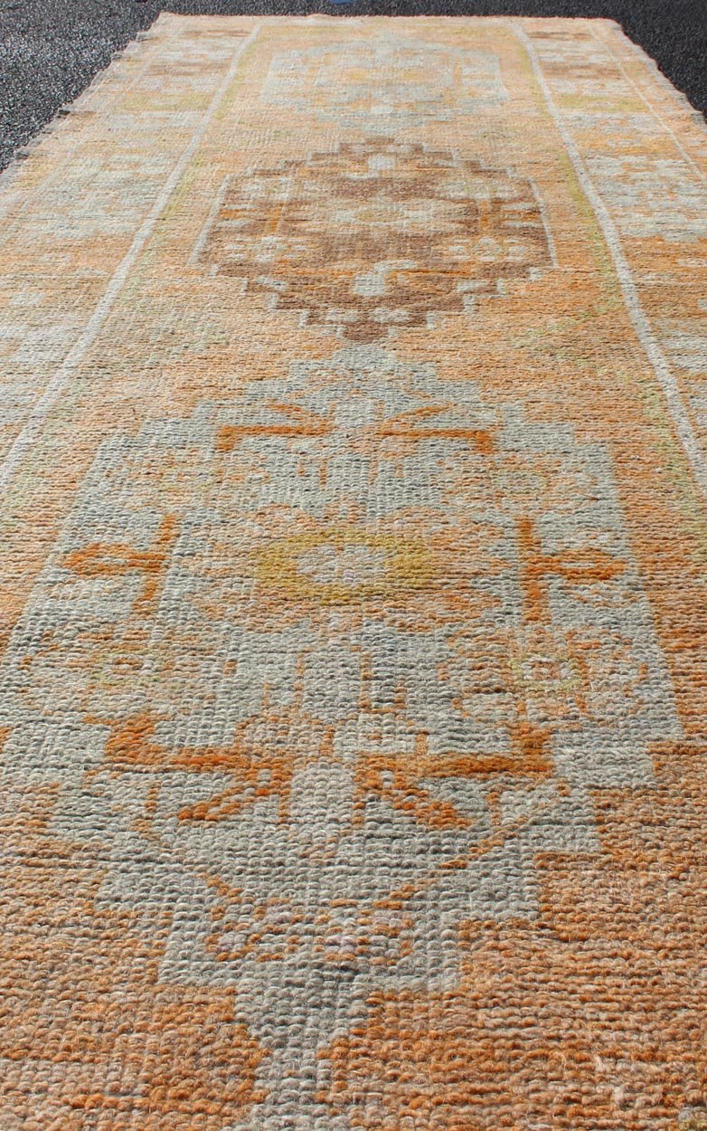 Antique Turkish Oushak Runner With Geometric Medallions in Light Blue , Orange. Orange, Light Blue, Yellow, light Brown, light gray blue, light green and multi colors vintage Turkish Oushak runner with Geometric medallions, rug EN - 179008, country ... - Keivan Woven ArtsEN - 179008 - 12345Rug