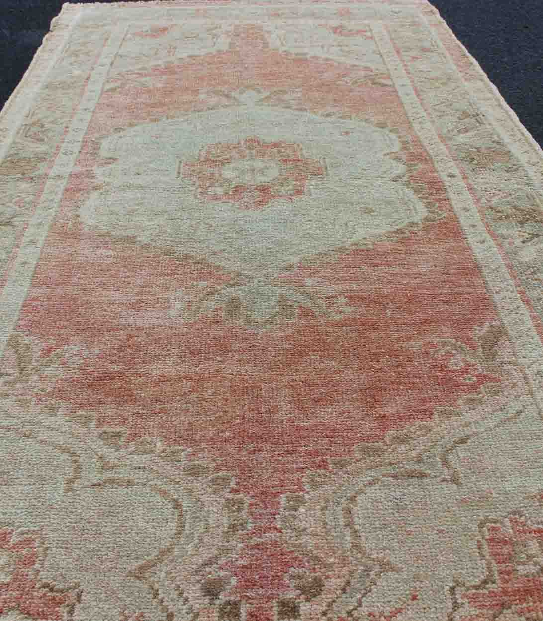 Faded Red and Taupe Vintage Turkish Oushak Rug with Layered Medallion Design Layered floral medallion design in light blue, soft red Oushak vintage rug from Turkey, Keivan Woven Arts / rug EN - 179018, country of origin / type: Turkey / Oushak, ci... - Keivan Woven ArtsEN - 179018 - 11799Rug