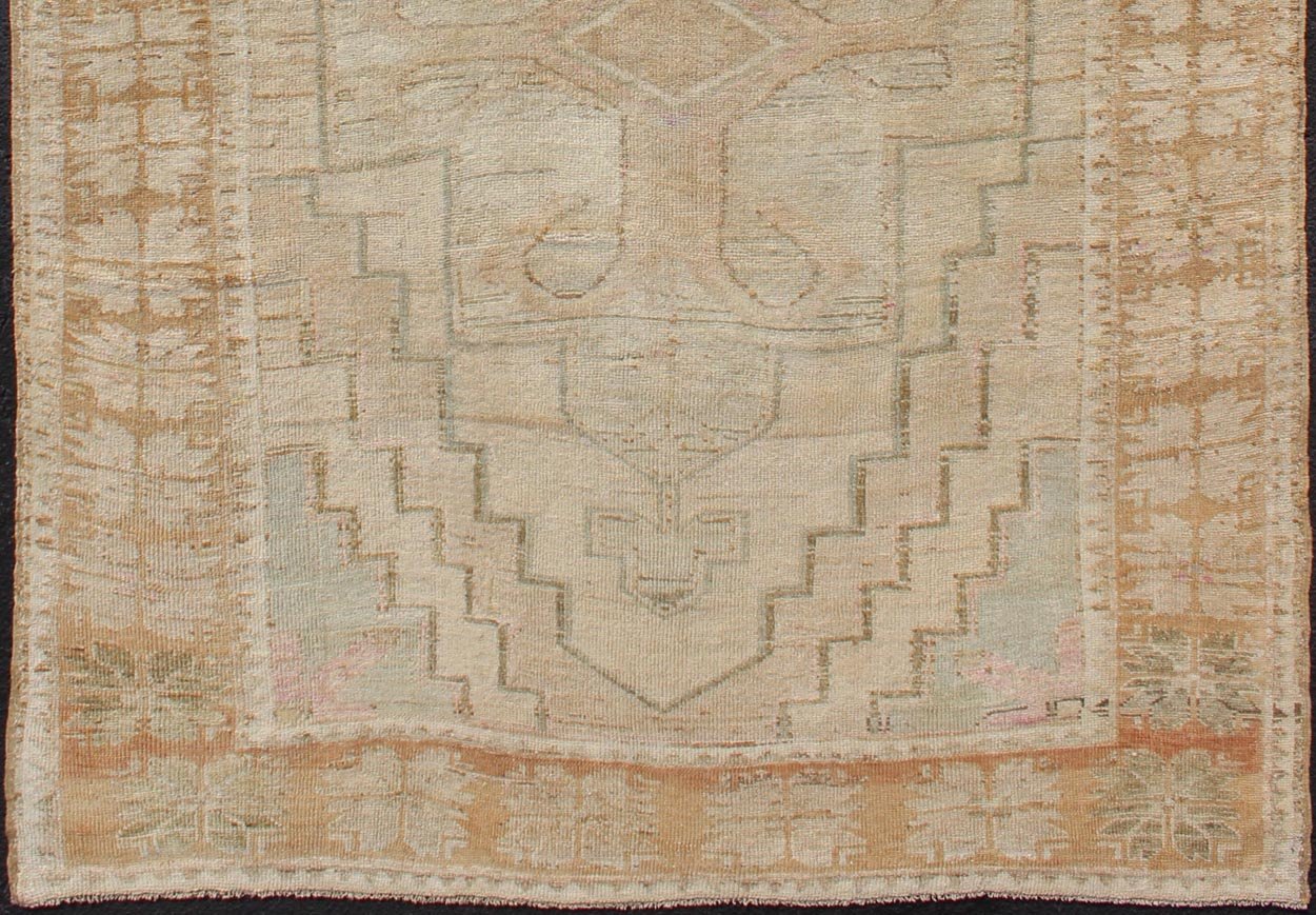 Oushak Vintage Rug with Pastel Colors in Tan, Brown, Butter, Peach, Lt. Blue. Light color Vintage Oushak rug with Central Medallions in Faded colors and medallion geometric design. Rug EN - 179021, country of origin / type: Turkey / Oushak, circa... - Keivan Woven ArtsEN - 179021 - 12541Rug